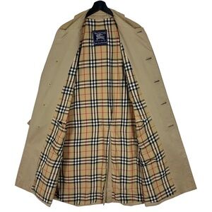 Burberry Tan Trench Coat with Timeless British Design